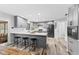 Modern kitchen with gray cabinets, white subway tile, and stainless steel appliances at 5911 N 400 W, Bargersville, IN 46106