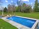Relaxing in-ground pool with lounge chairs at 5911 N 400 W, Bargersville, IN 46106