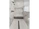 Large walk-in shower with marble tile, built-in seat, and rainfall shower head at 5911 N 400 W, Bargersville, IN 46106