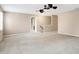 Bright bonus room featuring a ceiling fan and access to other rooms at 6938 Merritt Ridge Way, Avon, IN 46123