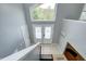 Two-story entry with double doors and staircase at 2005 Deer Lake Dr, Martinsville, IN 46151
