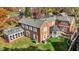 Brick house with a sunroom and detached garage, seen from above at 2505 Riverside Dr, Columbus, IN 47201