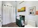 Stylish bathroom with a farmhouse sink and dark green vanity at 2505 Riverside Dr, Columbus, IN 47201