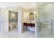 Spa-like bathroom with a shower, toilet, bidet, and marble floors at 2505 Riverside Dr, Columbus, IN 47201