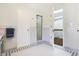 Bathroom with subway tile, shower, and marble vanity at 2505 Riverside Dr, Columbus, IN 47201
