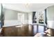 Formal dining room with hardwood floors and wainscoting at 2505 Riverside Dr, Columbus, IN 47201