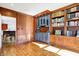 Spacious library featuring built-in bookshelves and a view into another room at 2505 Riverside Dr, Columbus, IN 47201