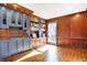 Elegant library with built-in bookshelves and wet bar at 2505 Riverside Dr, Columbus, IN 47201
