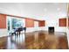 Spacious living room with hardwood floors, fireplace, and built-ins at 2505 Riverside Dr, Columbus, IN 47201