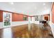 Bright living room with hardwood floors and built-in shelving at 2505 Riverside Dr, Columbus, IN 47201