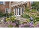 Charming pond with water feature and lush plants in a backyard setting at 2505 Riverside Dr, Columbus, IN 47201