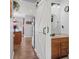 Clean half bathroom with a wooden vanity and barn door at 4277 Wellington Ct, Columbus, IN 47201