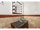 Basement bathroom with glass sink and lighted vanity at 4280 Hickory Ridge Blvd, Greenwood, IN 46143