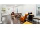 Bright and airy living room with hardwood floors and ample natural light at 2028 Hoyt Ave, Indianapolis, IN 46203