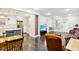 Open concept kitchen with white cabinets and a large island at 2028 Hoyt Ave, Indianapolis, IN 46203