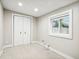 Simple bedroom with neutral walls and carpet flooring at 2028 Hoyt Ave, Indianapolis, IN 46203