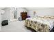 Upstairs bedroom with carpet, a dresser, and en-suite bathroom at 2028 Hoyt Ave, Indianapolis, IN 46203