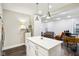 Open concept kitchen with white cabinetry and a spacious island at 2028 Hoyt Ave, Indianapolis, IN 46203