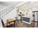 Updated kitchen featuring an island and dark hardwood floors at 2028 Hoyt Ave, Indianapolis, IN 46203