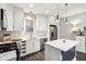 Modern kitchen with white shaker cabinets and quartz countertops at 2028 Hoyt Ave, Indianapolis, IN 46203