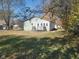 Single story home with a back deck and yard at 325 E Church St, Paragon, IN 46166