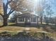 Single story home with front porch and tree at 325 E Church St, Paragon, IN 46166