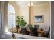 Formal dining room with a large table, hardwood floors, and a large window at 7610 Monte Carlo Way, Indianapolis, IN 46278