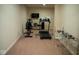 Basement home gym with treadmill, exercise bike, and weights at 7610 Monte Carlo Way, Indianapolis, IN 46278