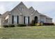 Beautiful two-story house with brick facade and manicured lawn at 7610 Monte Carlo Way, Indianapolis, IN 46278