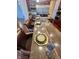 Breakfast bar with seating in a kitchen with granite countertops at 7610 Monte Carlo Way, Indianapolis, IN 46278