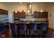 Island kitchen with granite countertops and stainless steel appliances at 7610 Monte Carlo Way, Indianapolis, IN 46278