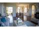 Spacious living room showcasing hardwood floors, high ceilings, and an open floor plan at 7610 Monte Carlo Way, Indianapolis, IN 46278