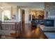 Spacious living area with hardwood floors, stone fireplace, and open floor plan at 7610 Monte Carlo Way, Indianapolis, IN 46278