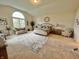 Spacious main bedroom with vaulted ceilings and large window at 7610 Monte Carlo Way, Indianapolis, IN 46278