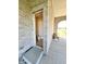 Convenient powder room with toilet and pedestal sink, located off patio at 7610 Monte Carlo Way, Indianapolis, IN 46278