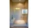 Large walk-in shower with glass enclosure and built-in seat at 7610 Monte Carlo Way, Indianapolis, IN 46278