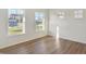 Spacious office with large windows and hardwood floors at 5856 Fair Oak Cir, Brownsburg, IN 46112
