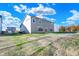 Two-story house with gray siding and backyard at 5856 Fair Oak Cir, Brownsburg, IN 46112
