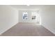 Bright bedroom with neutral walls and carpeted floors at 5856 Fair Oak Cir, Brownsburg, IN 46112