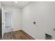 Laundry area with washer and dryer hookups and access to another room at 5856 Fair Oak Cir, Brownsburg, IN 46112