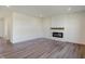 Living room with hardwood floors and fireplace at 5856 Fair Oak Cir, Brownsburg, IN 46112