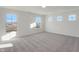 Spacious bedroom with large windows and plush carpeting at 5856 Fair Oak Cir, Brownsburg, IN 46112