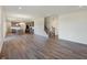 Open concept kitchen with island and hardwood floors at 5856 Fair Oak Cir, Brownsburg, IN 46112