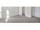 Bright bedroom with carpet flooring and spacious closet at 5856 Fair Oak Cir, Brownsburg, IN 46112