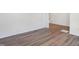 Hardwood floor hallway with access to other rooms at 5856 Fair Oak Cir, Brownsburg, IN 46112