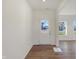 Bright entryway with hardwood floors and access to other rooms at 5856 Fair Oak Cir, Brownsburg, IN 46112