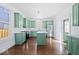 Open concept kitchen with island and hardwood floors at 631 Cottage Ave, Indianapolis, IN 46203