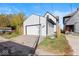 White, two-car garage with driveway at 631 Cottage Ave, Indianapolis, IN 46203