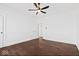 Well-lit bedroom with hardwood floors and access to other rooms at 631 Cottage Ave, Indianapolis, IN 46203