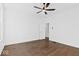 Comfortable bedroom, hardwood floors, ceiling fan, and an open doorway at 631 Cottage Ave, Indianapolis, IN 46203